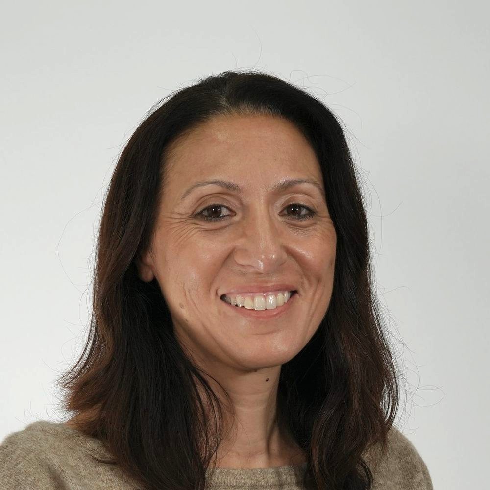 Law firm team headshot on grey