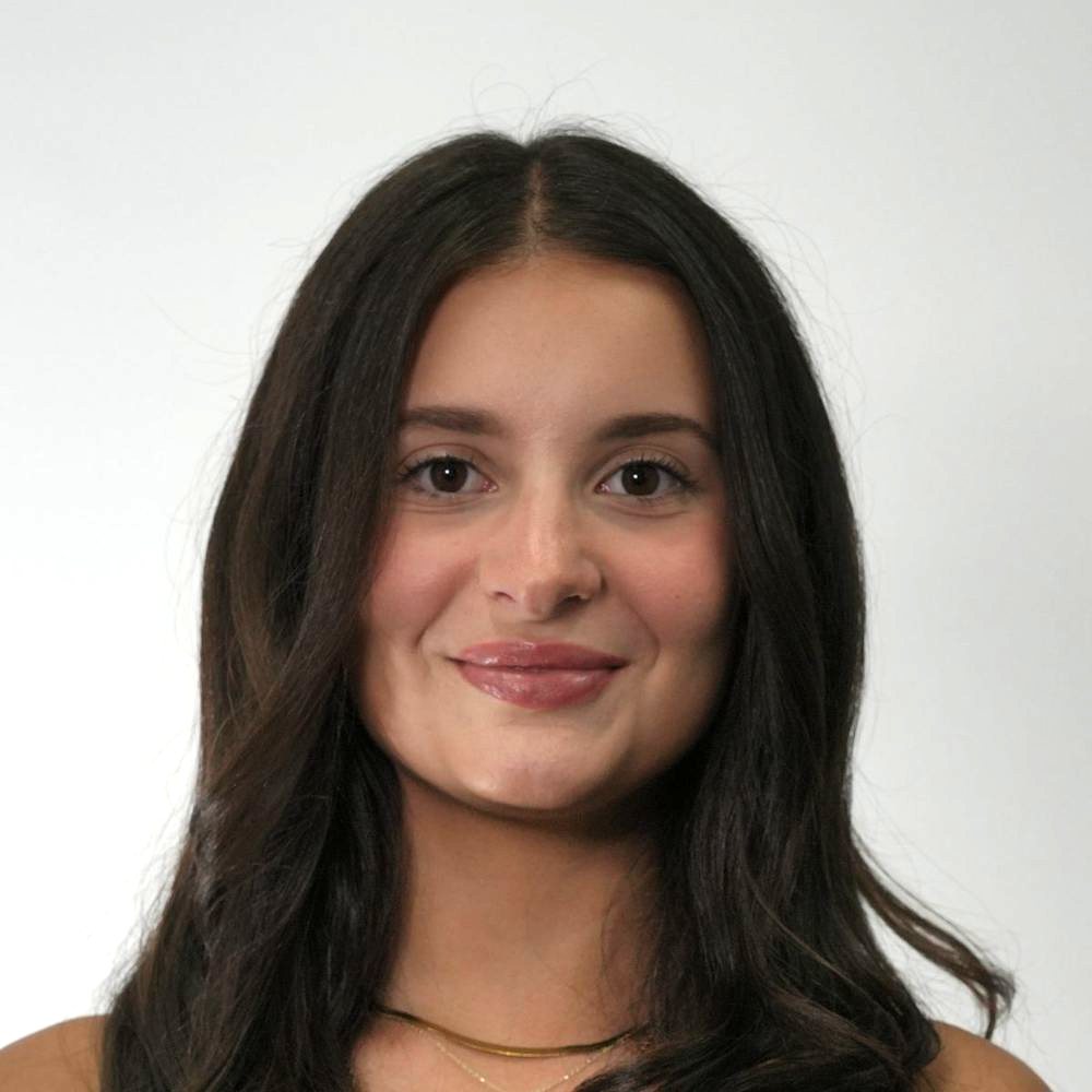 Law firm team headshot on grey