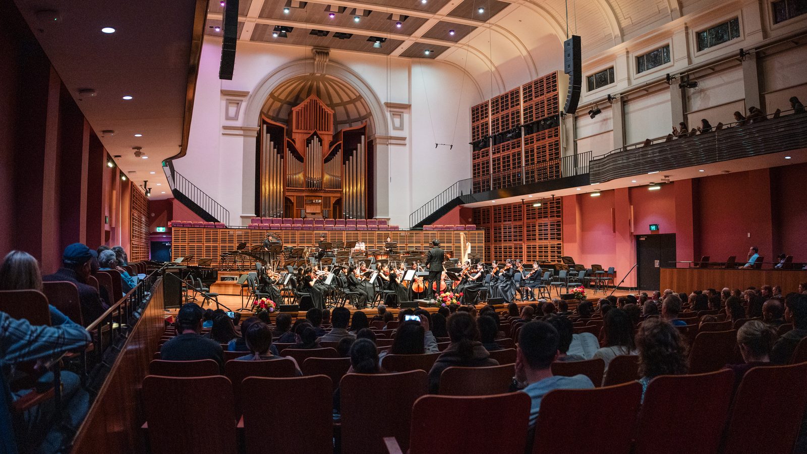Full house watching a youth orchestra at the Sydney Conservatorium