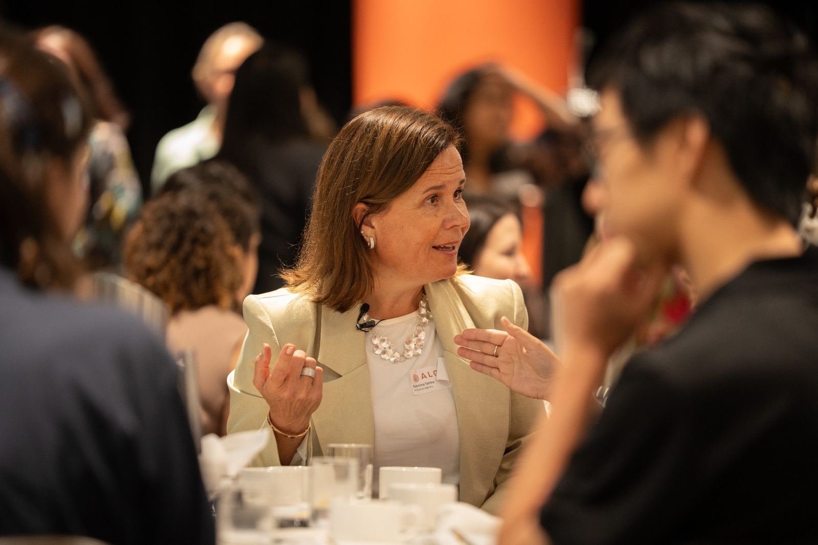 Guest mid conversation at her table